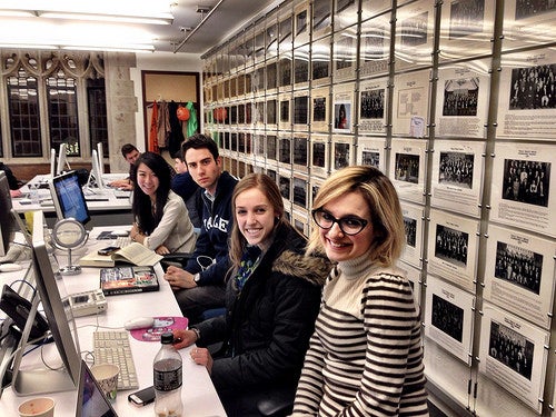 Yale Daily News staff at workstations.