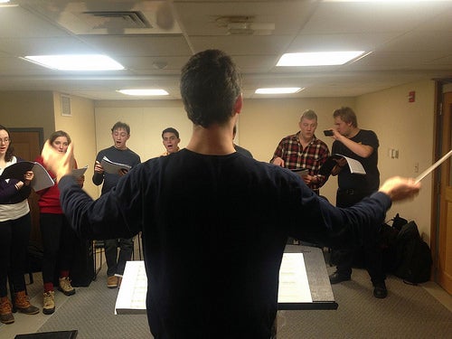 Conducting cast members of &quot;Harold&quot; in rehearsal.