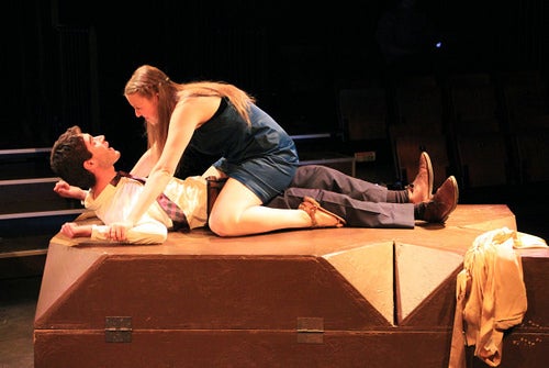 A female actress straddles a male one in a scene from a modern take on a Shakespeare play.