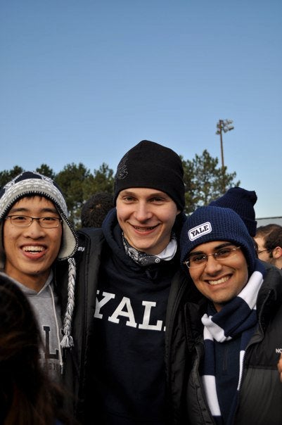 Three students in Yale University apparel.