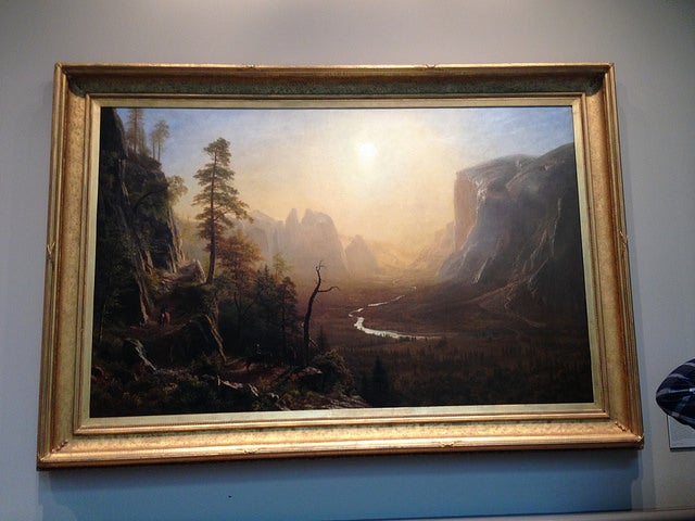 A landscape painting of Yosemite National Park.