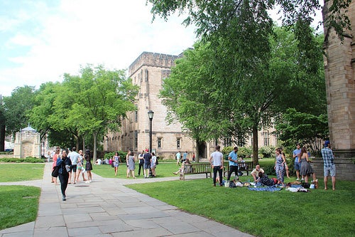 Cross campus bustling with passerby during reunion weekend.