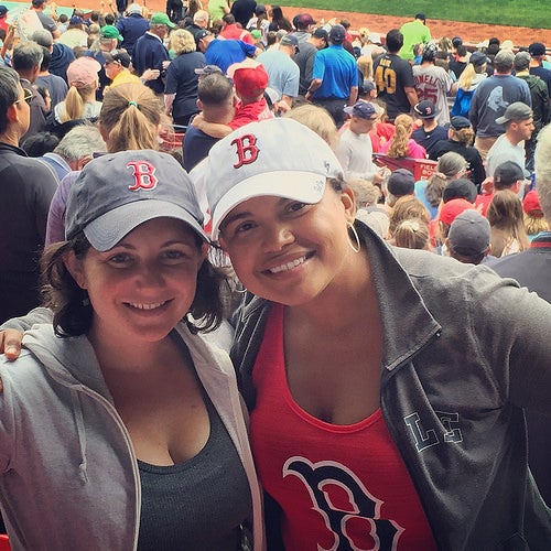 Alfie with a friend at a Boston Red Sox game.