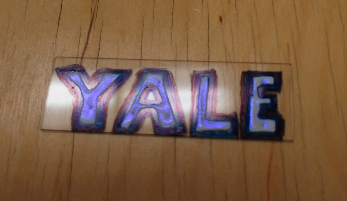 The nanoparticles spelling out &quot;YALE&quot;.