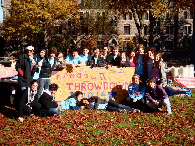 The Freshman Class Council with a sign reading &quot;Howdown Throwdown 2014&quot;