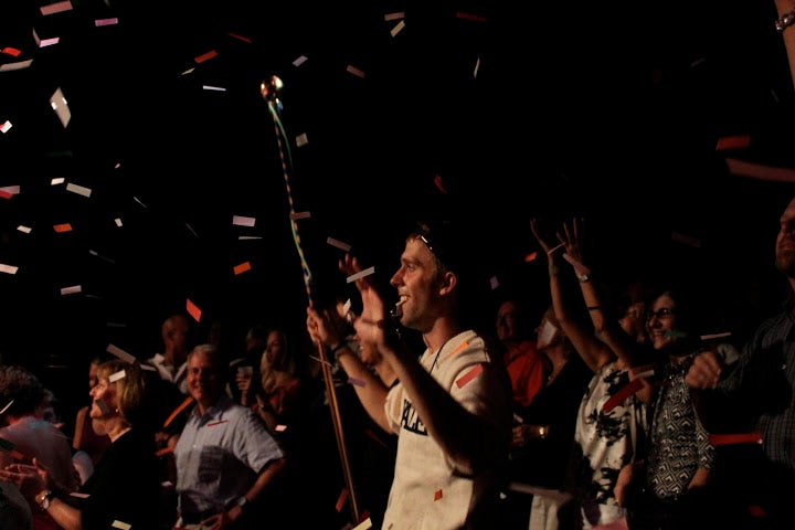 The author in the crowd, conducting with his makeshift conductor's baton.