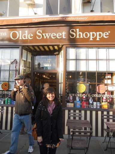 Michelle in front of the &quot;Olde Sweet Shoppe&quot;.
