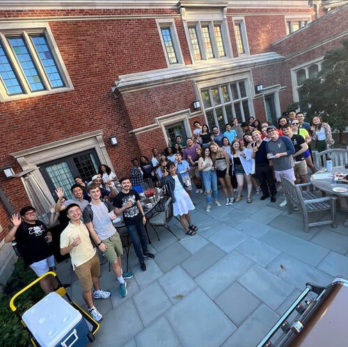 About 40 seniors gathered on the patio of our Head of College's house.