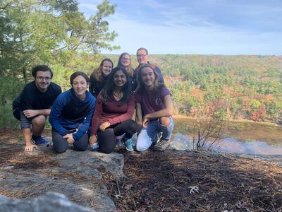 seven people on a fall overlook