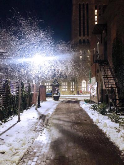 Nighttime snowy walkway