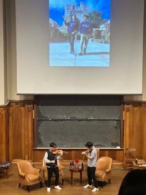 Two String performing and showing their photoshoot from their last Yale visit