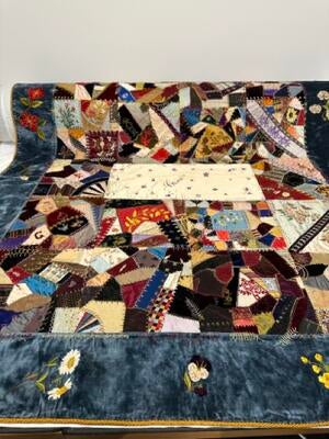 Crazy quilt with fabric from all over the world made in Ohio