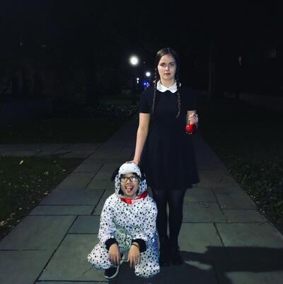 girl dressed as Wednesday Addams and girl dressed as a dalmation