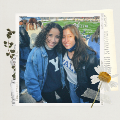 Polaroid photo of Paulina and her suite mate Dianna at a football game. 