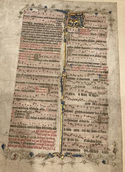 An ornately decorated sheet of music that had at one point been a book binding
