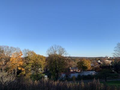 The view from the overlook — East Haven, blue skies, and the Yale Farm.