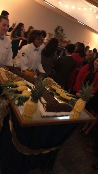 &quot;Y&quot; Yule Log carried by Yale Dining employees