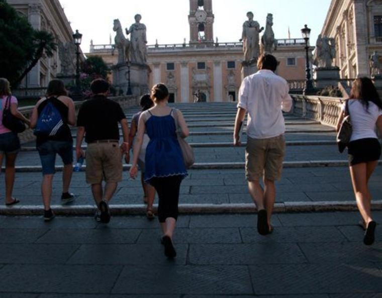 A group of students climb the Capitoline Hill in Rome.