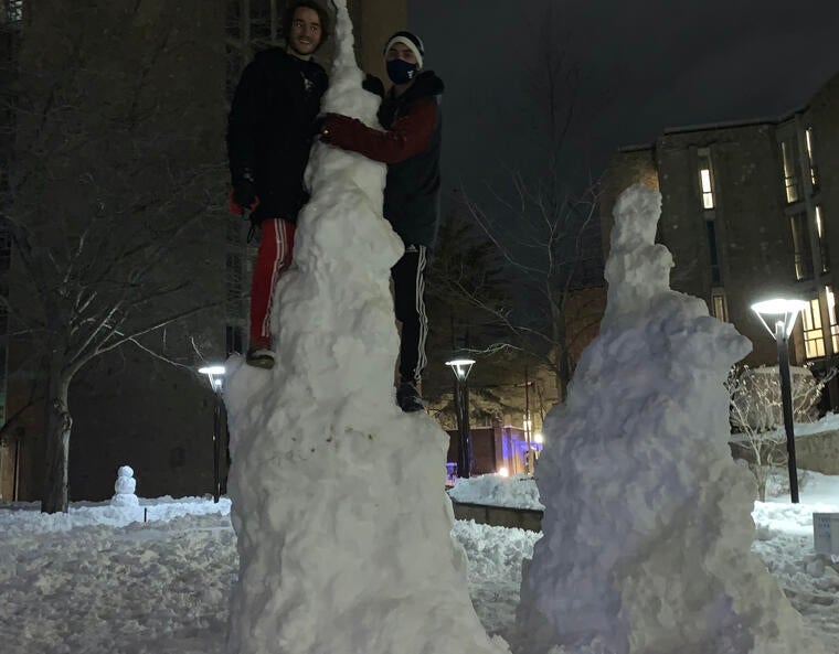 Two boys on a snow tower