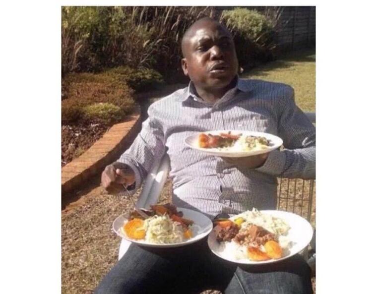 A man thoroughly enjoying his food