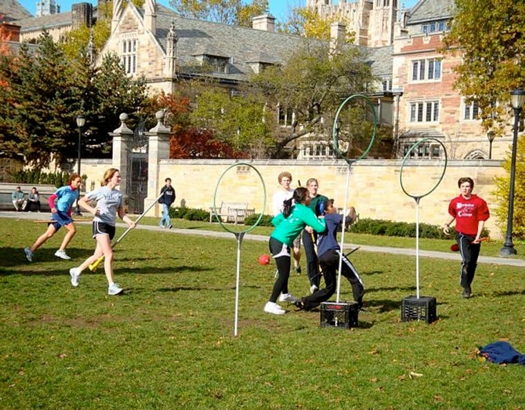 Students play a heated game of Quidditch on Cross Campus.