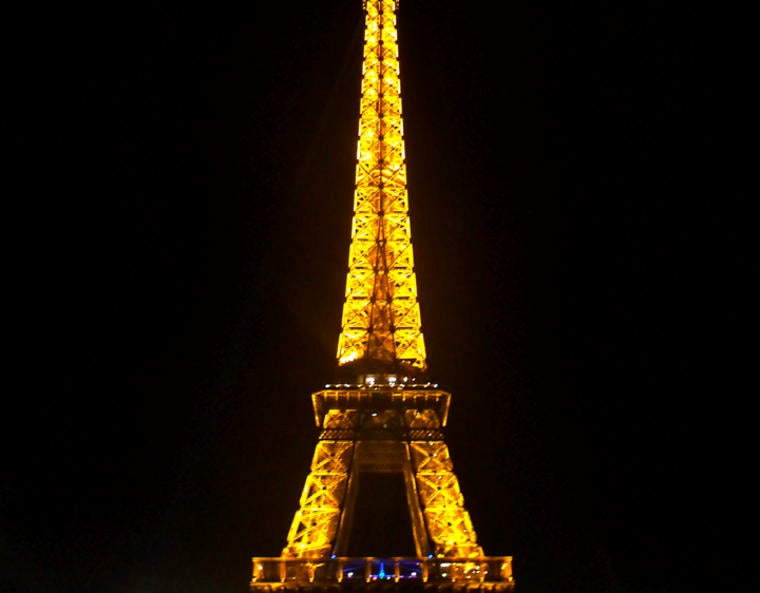 The Eiffel Tower at night.
