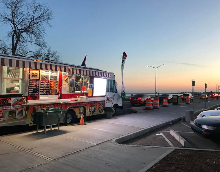 Taco trucks at sunset