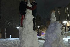 Two boys on a snow tower